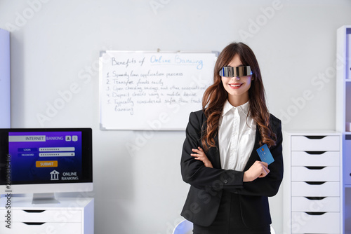 Young businesswoman in AR g...