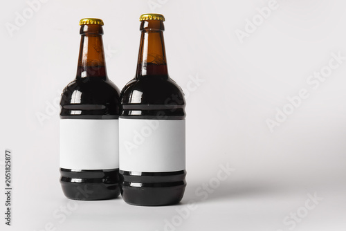 Bottles of cold beer on gre...