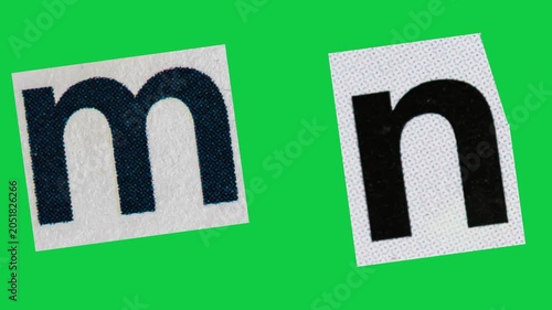 Stop Motion graphic Alphabet letter M N magazine paper cut collage, ransom note style text, additional video elements on green screen