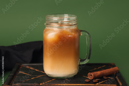 Mason jar of iced latte wit...