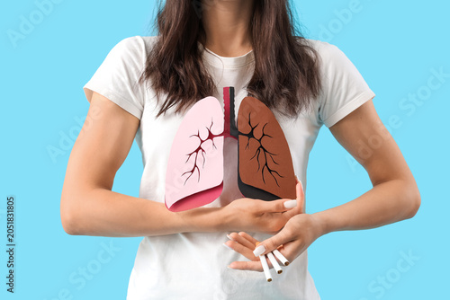 Young woman with paper lung...