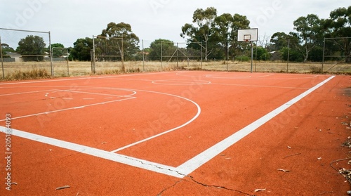 Outdoor Basketball Court with Red Surface