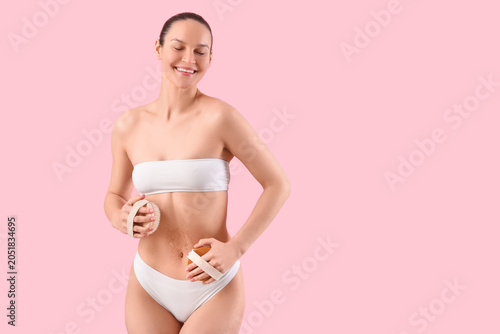 Happy young woman with mass...