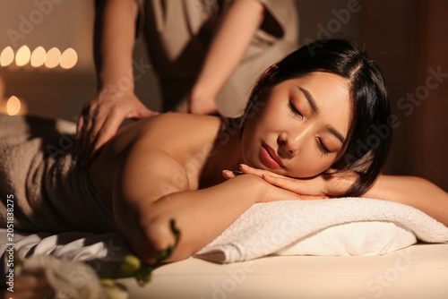 Pretty young Asian woman ha...