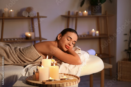 Pretty young woman in spa s...