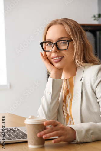 Young businesswoman with st...