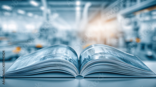 Open book in a modern laboratory environment, representing scientific knowledge, academic research, education, and medical learning.
