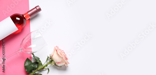 Bottle of pink wine with be...