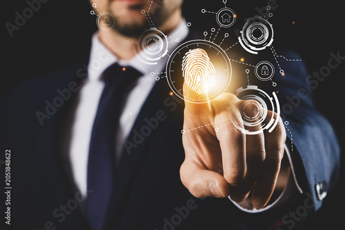 Young businessman using vir...