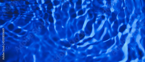 Clean water on blue background