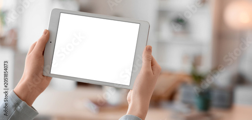 Female hands with blank tab...