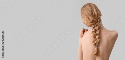 Woman with long braided hai...