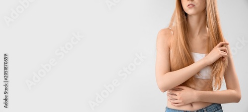 Young woman with long healt...
