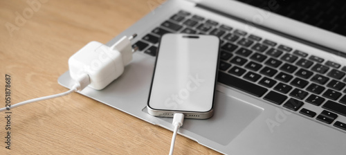 Modern laptop with mobile p...
