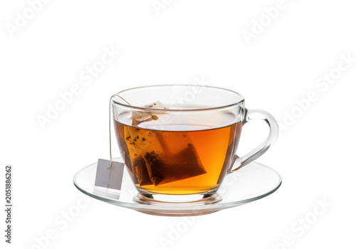 Hot tea in a glass cup on a saucer
