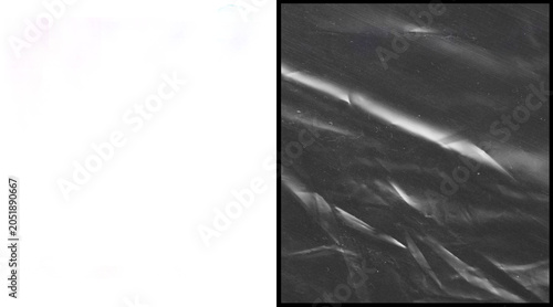 Photos Crumpled plastic wrap texture on black background, wrinkled transparent cellopha