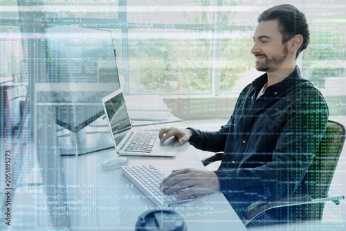 Smiling male software devel...