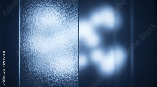 Fotografie Frosted glass surface window pane with diffuse abstract shapes glowing in soft f