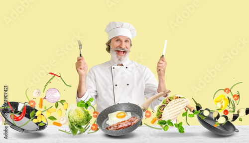 Mature male chef on color b...
