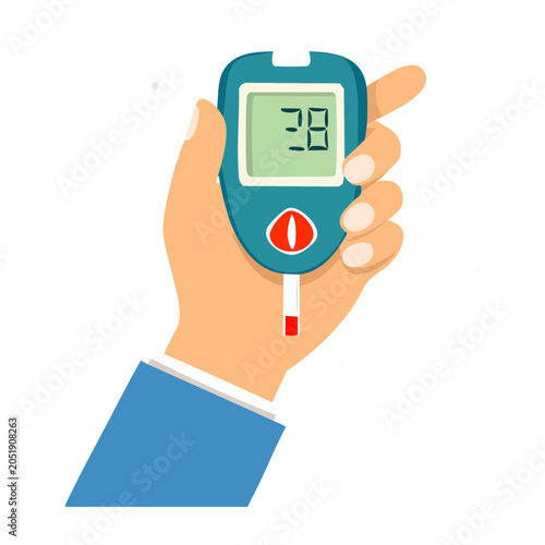 Hand holding a blood glucose meter for diabetes monitoring