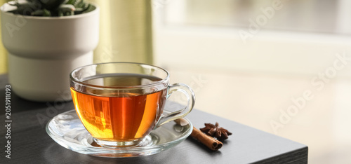 Warm herbal tea in clear gl...