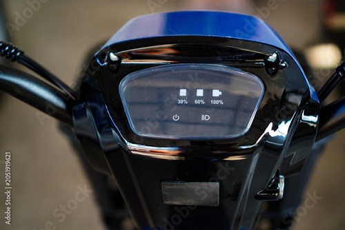 Electric vehicle dashboard battery indicator close up | e bike power and smart mobility concept