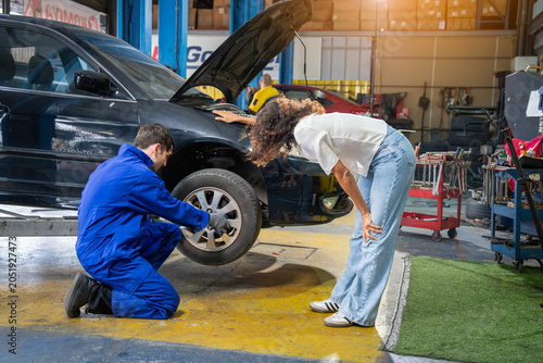 Car maintenance action auto repair shop photography indoor close-up vehicle care