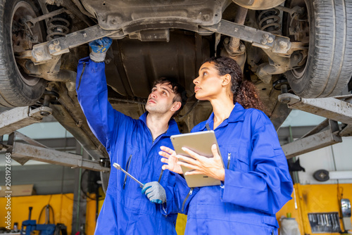 Vehicle maintenance inspection auto shop professional service workshop space close-up technical skills for optimal performance