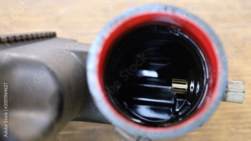 Sensor in the car intercooler pipe. Close-up of temperature and air pressure sensors in car intercooler pipes on dirty brown paper background with selective focus.