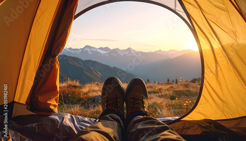 View from Tent at Sunrise Over Mountain Landscape.