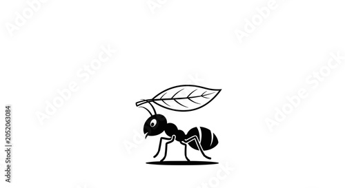 An industrious ant carrying a leaf outdoors