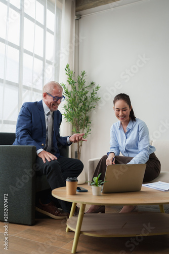 Business man and woman discussing during client meeting