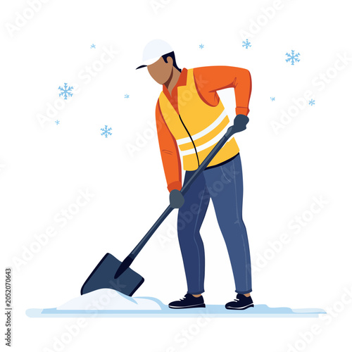 Man in safety vest shoveling snow in winter