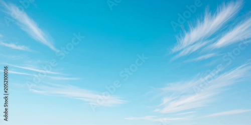 Blue sky with white clouds on a clear sunny day with bright natural atmosphere