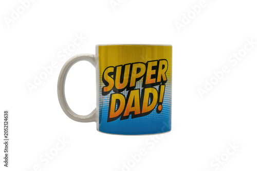A white ceramic coffee mug with a blue and yellow comic book style featuring the text super dad, isolated on a white background