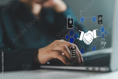 Business partnership and contract agreement concept with digital handshake, compliance documents and workflow approval. Corporate collaboration, strategic alliance, contract management and trust.