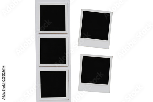 A collection of blank white instant frames, arranged in a vertical strip and two separate squares, isolated on a black background