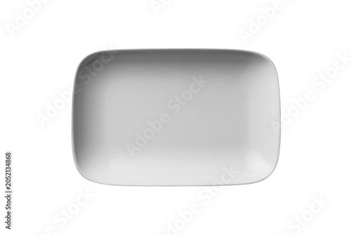 Empty white rectangular ceramic plate with rounded corners isolated on a white background, for food presentation, and dining concepts