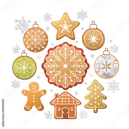 Christmas gingerbread cookies and ornaments arranged in a circle