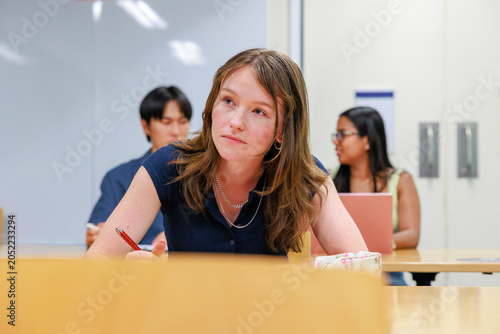 International University Students Studying in Campus Classroom