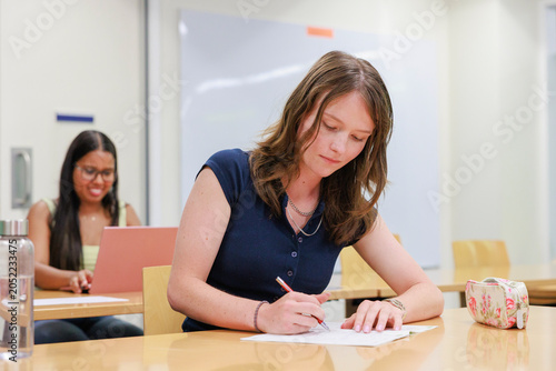 International University Students Studying in Campus Classroom
