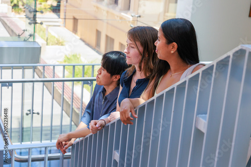 International Students Socializing on Staircase at University