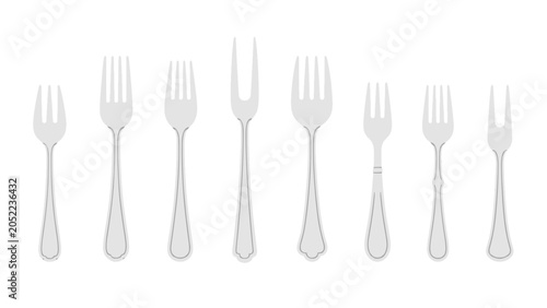Foto Set of silver serving and dining forks isolated on white