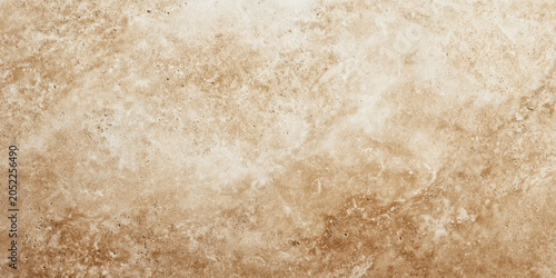 Soft studio lighting on seamless texture of honed beige stone surface, natural pattern, calming and elegant