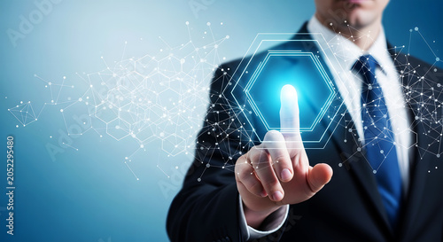 Man in suit touching glowing blue hexagon network interface finger