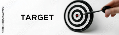 Dartboard Aim: A hand holdi...