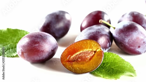 fresh plums isolated on white