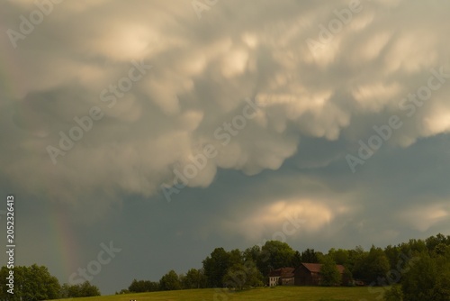 Mammatus clouds and rainbow after a thunderstorm