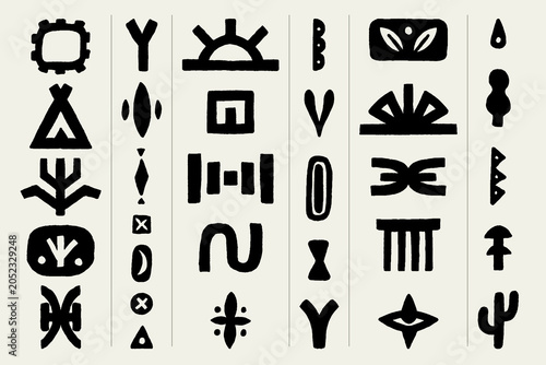 set of hand drawn tribal symbols and elements