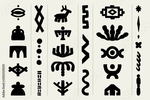 set of hand drawn tribal symbols and elements